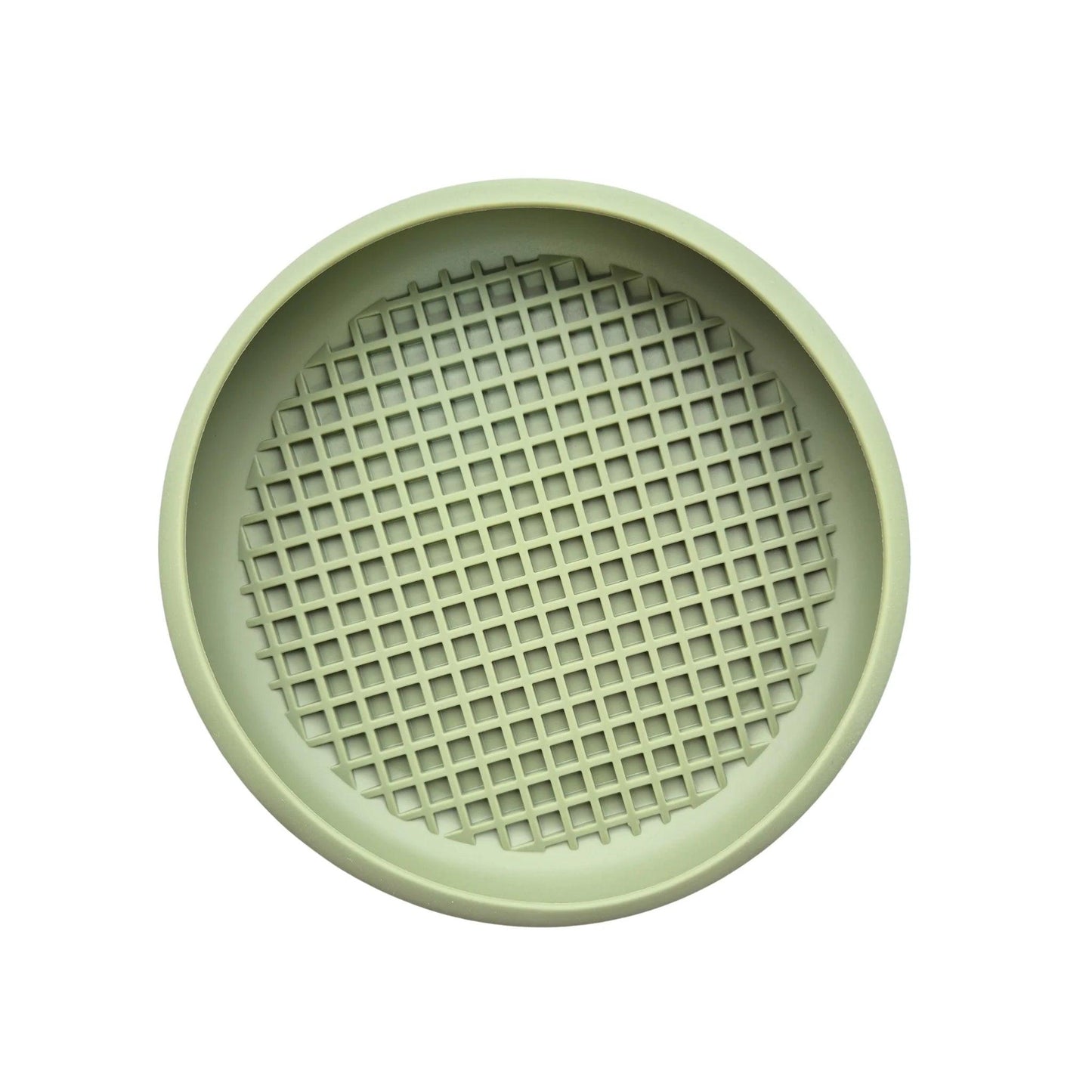 Image description: Lick Mat with curved edge that helps to catch food.