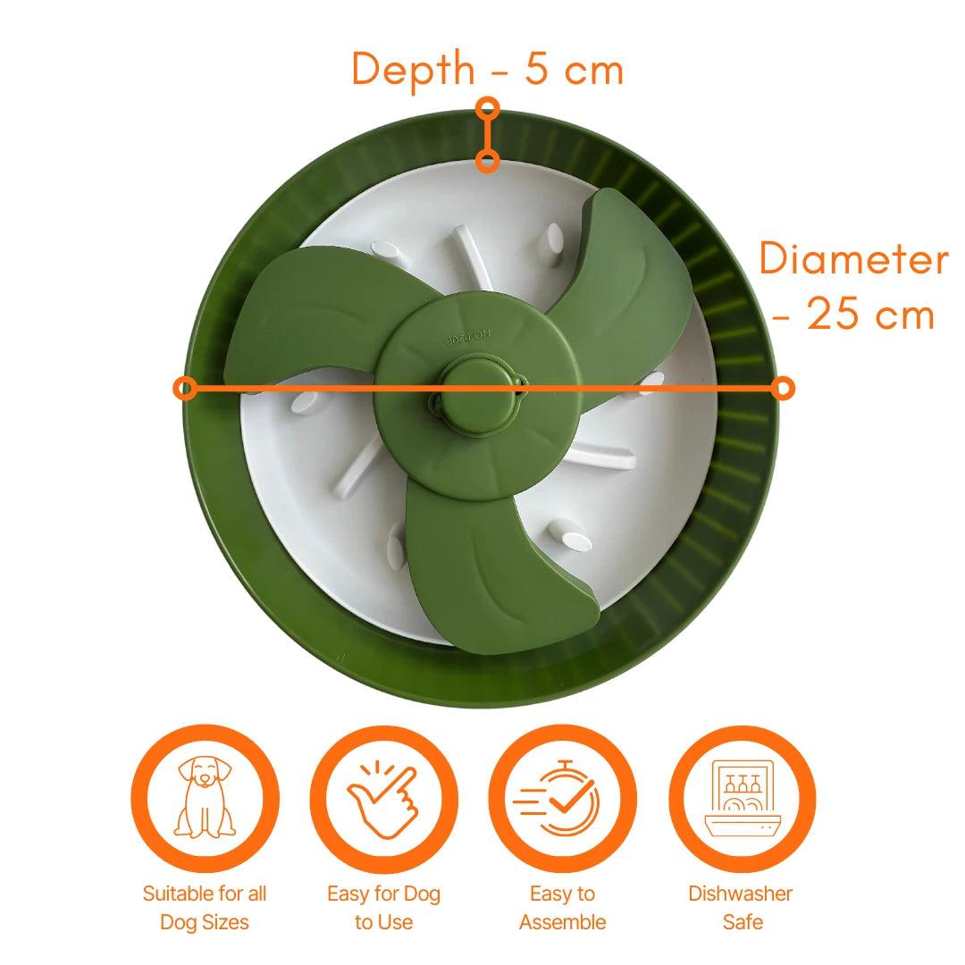 Image description: Slow feeder with rotating spinner with sizing lines displaying depth 5 cms and diameter 25 cms.
Text on image: Suitable for all dog sizes, Easy for dog to use, Easy to assemble, Dishwasher safe.