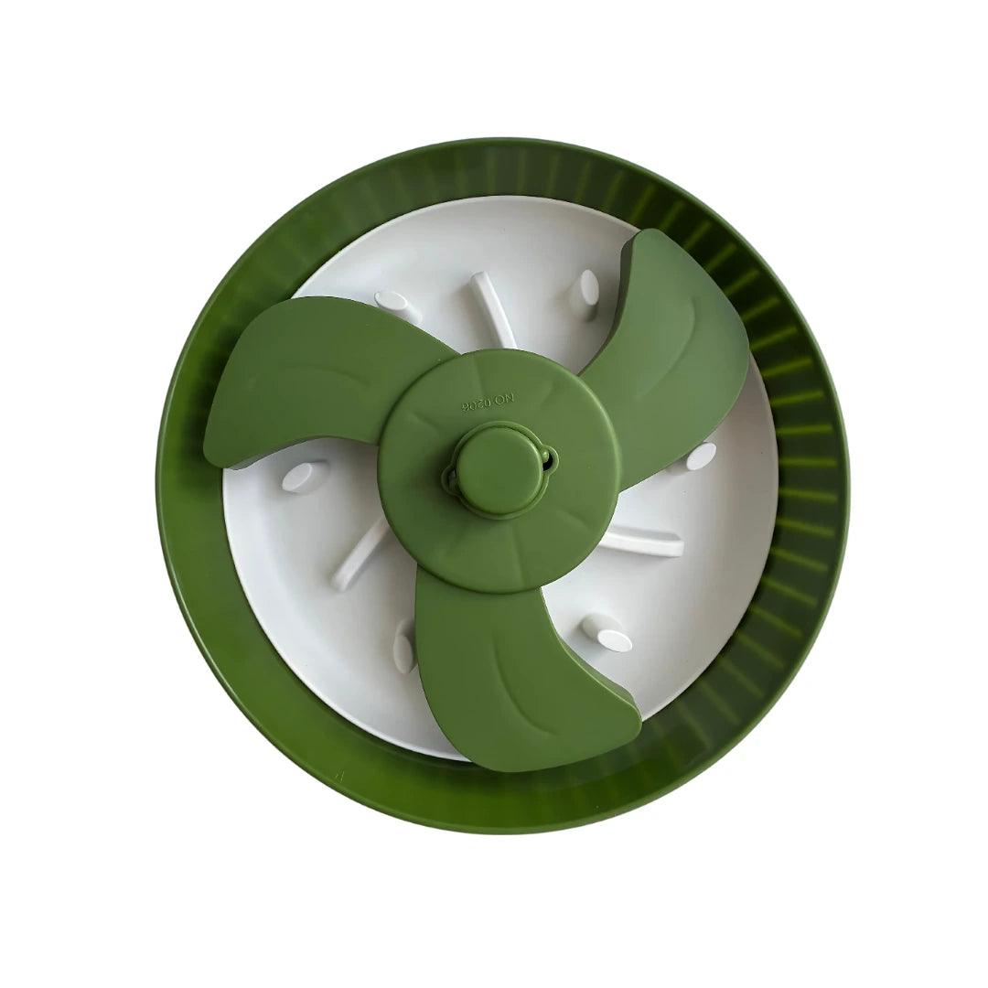 Image description: Slow Feeder with rotating spinner, filled with kibble.