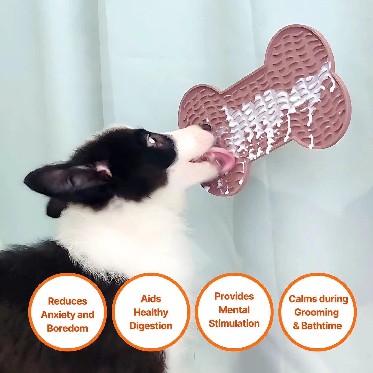 Image description: Dog licking yoghurt off a lick mat bone shape stuck to sliding glass door. 
Text on image: Reduces anxiety and boredom, Aids healthy digestion, Provides mental stimulation, Calms during grooming and bathtime. 